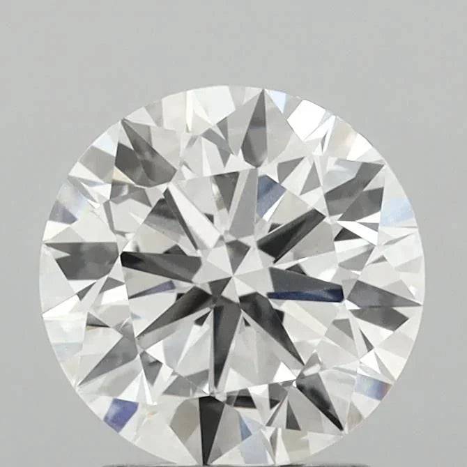 Runder, geschliffener Diamant, funkelnd auf grauem Hintergrund, lose Edelstein