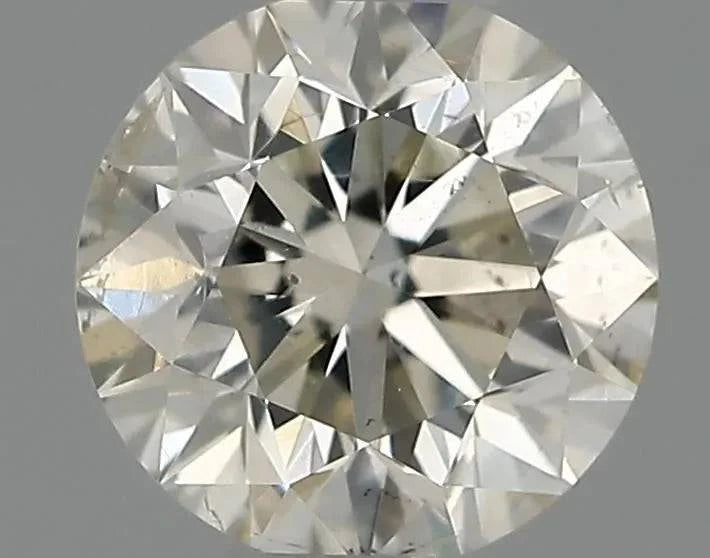 Runder, natürlicher Diamant in Brillantschliff mit hoher Brillanz auf grauem Hintergrund